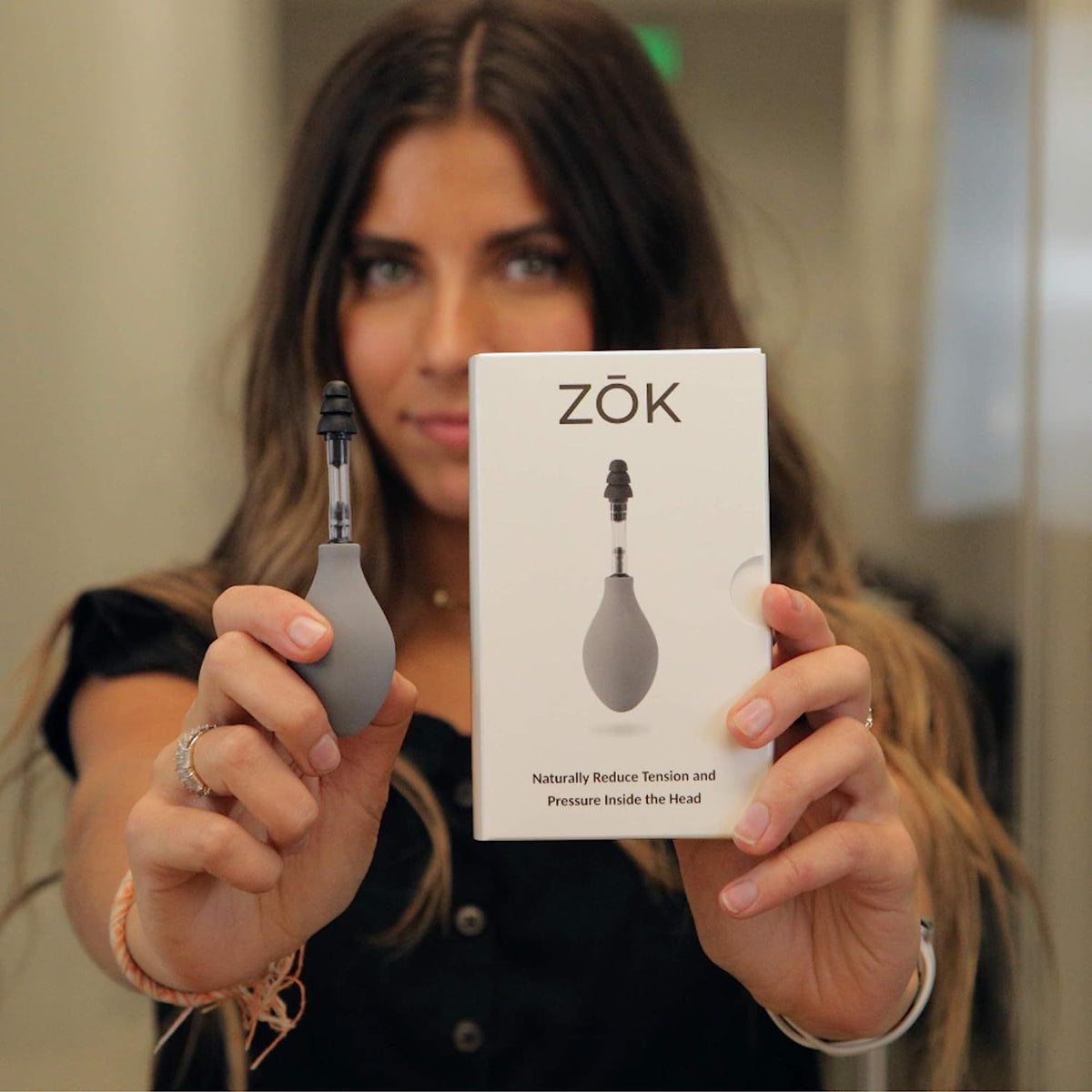 Zok - ear pressure and migraine reduction tool